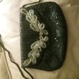 Small clutch with strap